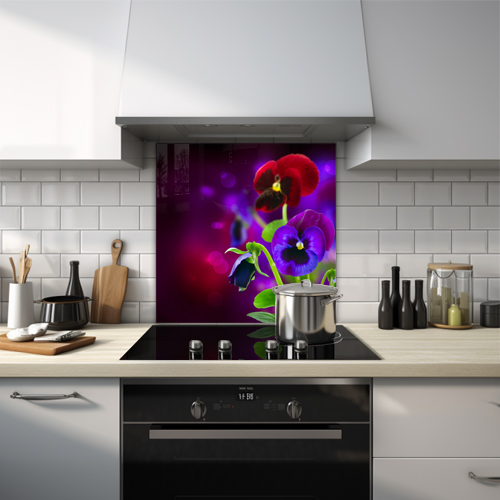 Purple and red pansy on a dark purple background.