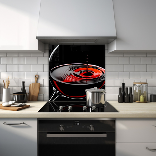 Close-up of a wine droplet bouncing from the wine surface.