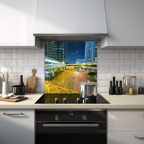 Night time view of an empty road in China glass splashback.