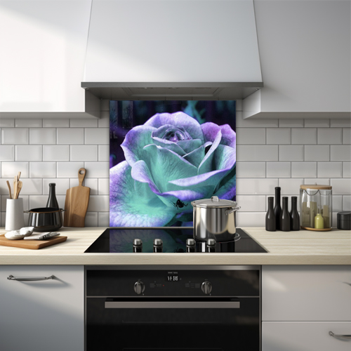 Purply green coloured rose with a spider glass splashback.
