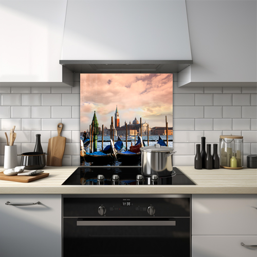 Glass splashback depicting a sunset over the Venice canals with gondolas and palaces.