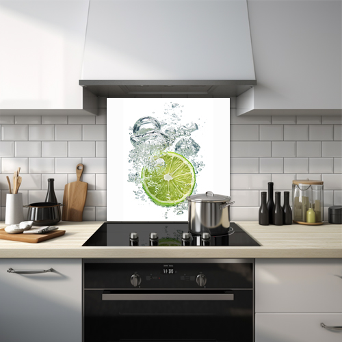 Sinking lime surrounded by water bubbles glass splashback.