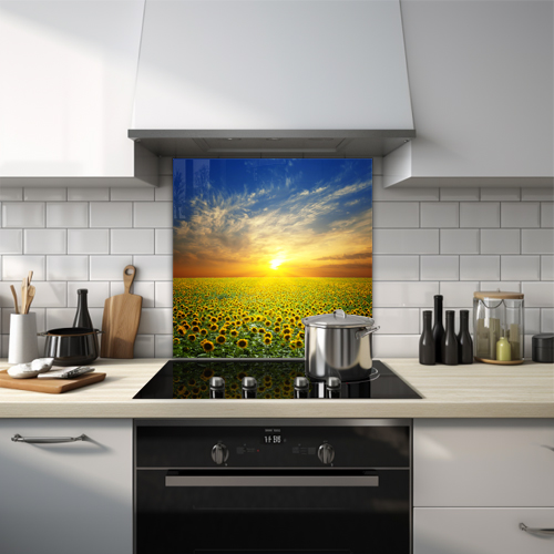 Field of sunflowers under a sunset with wispy clouds glass splashback.