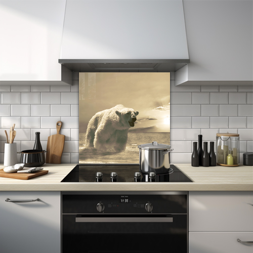 Huge polar bear in ocean with sunset in background glass splashback.