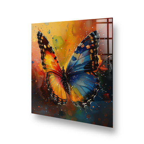 Vibrant butterfly splashback art in warm tones against a kitchen hob Side View