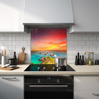 Rocky shore with colourful sunset glass splashback. thumbnail