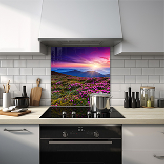 Field of pink flowers with mountain sunset glass splashback. thumbnail