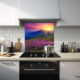Sunset over lake with mountains in the backdrop glass splashback. thumbnail